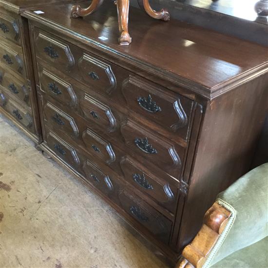 Portuguese carved walnut chest of four long drawers